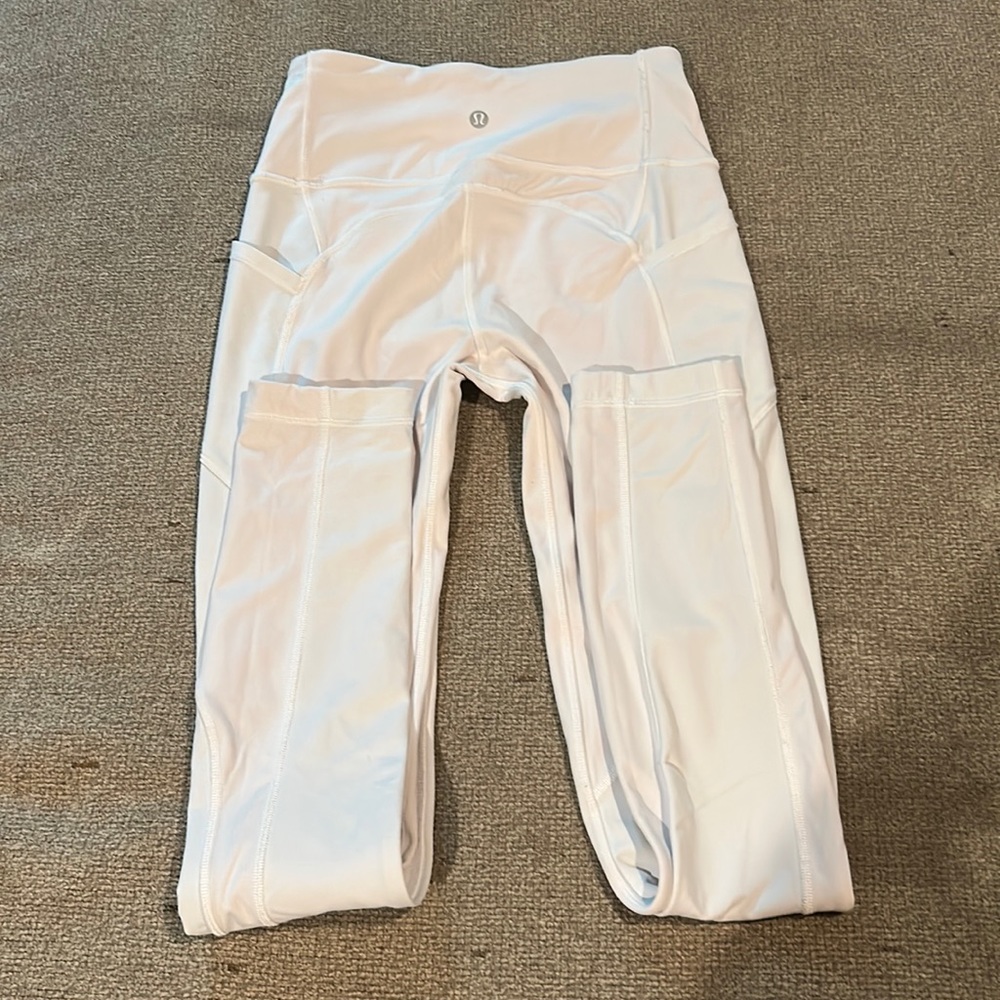 White lululemon high rise leggings.